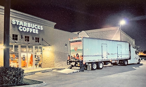 QCD Truck delivering to Starbucks